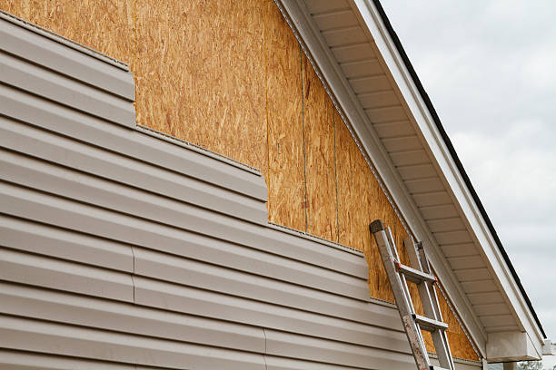 Professional Vinyl Siding technician working in Williamstown, PA